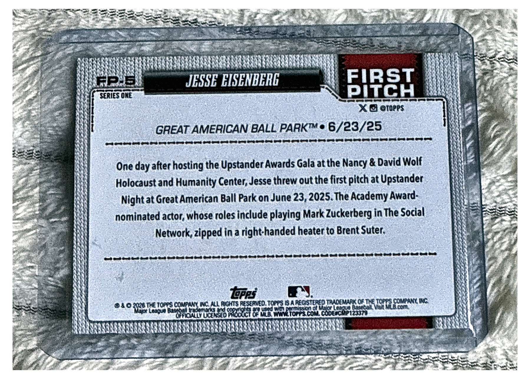 Jesse Eisenberg FP-5 - reverso con la historia de la primera bola